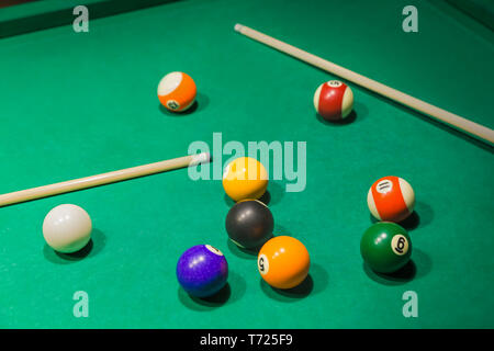 Billiard balls on pool green table Stock Photo