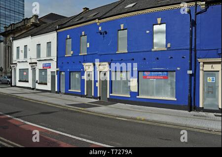 Boarded up shops and bars awaiting redevelopment in Cardiff City Centre Stock Photo