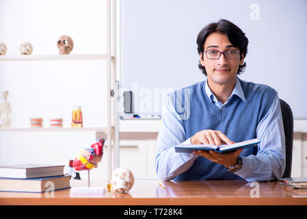 Young lecturer teacher teaching anatomy Stock Photo
