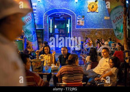 Rodeo steak house grill restaurant in La Calzada a gastronomic street in Granada Nicaragua with lots of tourists and locals enjoying fine food outdoor Stock Photo