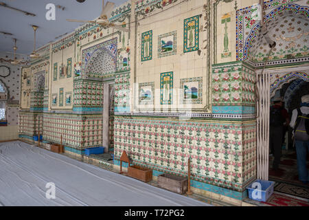 Star Mosque, is a mosque located in Armanitola area, Dhaka, Bangladesh. The mosque has ornate designs and is decorated with motifs of blue stars. It was built in the first half of the 19th century by Mirza Golam Pir. Stock Photo