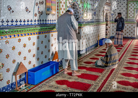 Star Mosque, is a mosque located in Armanitola area, Dhaka, Bangladesh. The mosque has ornate designs and is decorated with motifs of blue stars. It was built in the first half of the 19th century by Mirza Golam Pir. Stock Photo