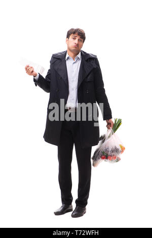 Young handsome man with vegatables in shopping concept Stock Photo