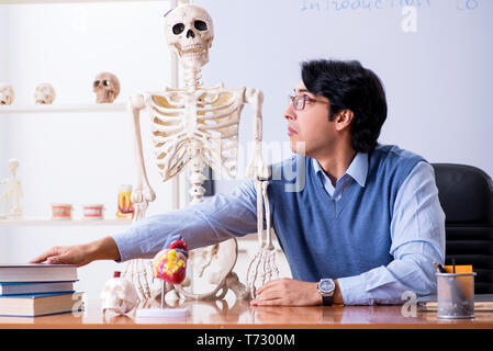 Young lecturer teacher teaching anatomy Stock Photo