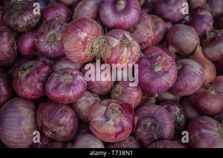 A bunch of organic red onions filling the frame Stock Photo
