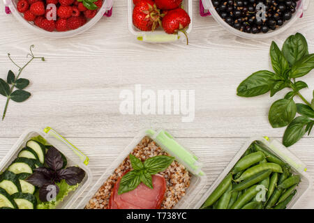 Healthy meal prep containers with fruits, berries, snacks and vegetables.  Takeaway food on white background, top view. Lunch box to school Stock  Photo - Alamy