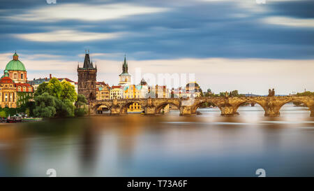 View of the Vltava River and the bridges shined with the sunset sun, Prague, the Czech Republic Stock Photo