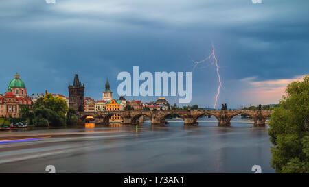 Summer storm over Charles bridge with lightning, Prague, Czech Republic. Stock Photo