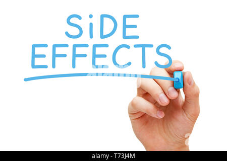 Hand writing Side Effects with blue marker on transparent wipe board isolated on white background. Stock Photo