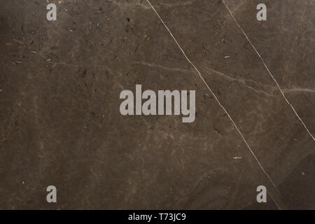 Abstract dark brown marble texture on macro. Beautiful natural stone background. High resolution photo. Stock Photo