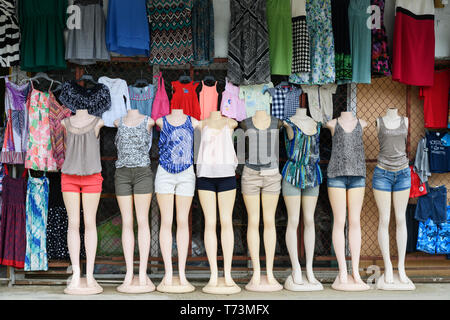 Women's clothing on display on mannequins standing in a row; Roatan, Bay Islands Department, Honduras Stock Photo