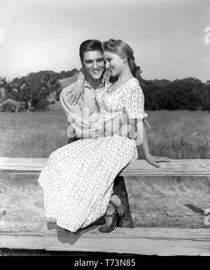 Elvis Presley Debra Paget LOVE ME TENDER 1956 director Robert D. Webb on set location candid filming Twentieth Century Fox Stock Photo