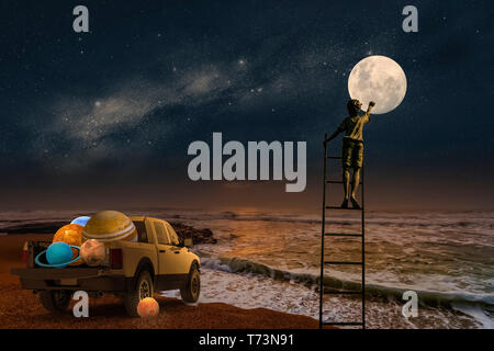 Composite image of a boy standing on a ladder touching the moon with a pickup truck full of planets at the edge of the ocean Stock Photo