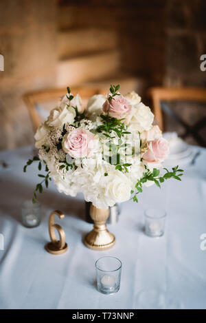 Table setting at wedding reception. Wedding flowers. Stock Photo