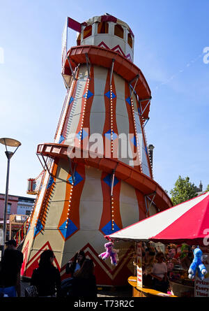 Traditional helter skelter fairground ride Anchor Square Bristol Stock Photo