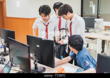 Student Group Computer Science Engineering Group of Thai University Students discussing about their final computer ...