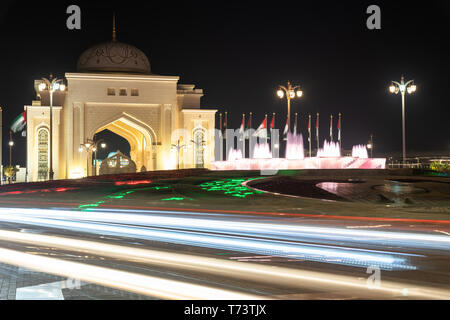 Abu Dhabi, UAE - April 4. 2019. Arch at entrance to Presidential Palace in night Stock Photo