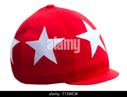 Jockey's headdress, red round cap with visor isolated on white background. Stock Photo