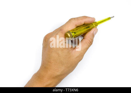 Male hand holding electric tester screwdriver to check the electrical , Test light, man hand isolated on white background High resolution image galler Stock Photo