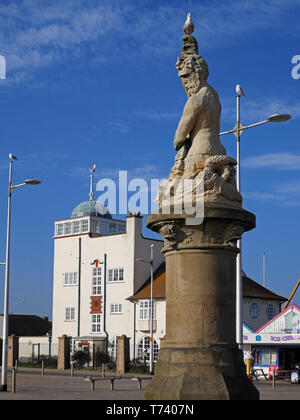 The Time Ball Tower, home to The Royal Norfolk & Suffolk Yacht Club, and Statue of Triton, on the seafront at Lowestoft, Suffolk, England, UK Stock Photo