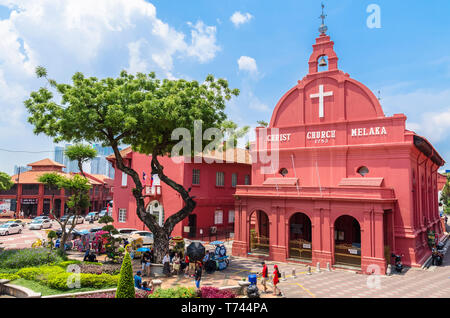 Malacca,Malaysia - April 21,2019: Scenic view of the Christ Church Malacca and Dutch Square,people can seen exploring around the it. It has been liste Stock Photo
