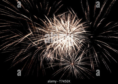 Colorful multi-colored fireworks, salute on the background of the black sky on holiday Stock Photo