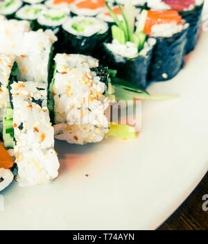 Food, travel and healthy eating concept - Japanese sushi in a restaurant at lunch time, asian cuisine