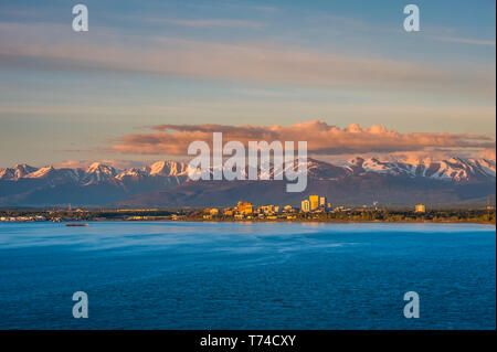 Anchorage skyline seen from Earthquake Park at sunset; Anchorage, Alaska, United States of America Stock Photo