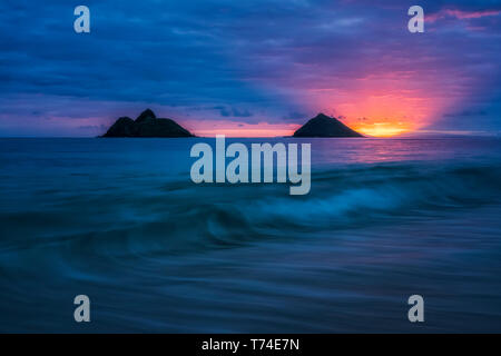 Sunrise over Lanikai Beach; Oahu, Hawaii, United States of America Stock Photo