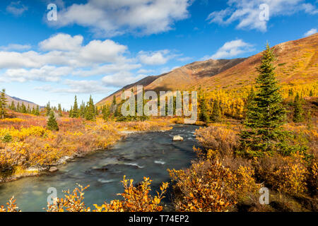 Autumn colours and South Fork Eagle River on the Symphony Lakes/Eagle Lake hike in the Chugach State Park Stock Photo