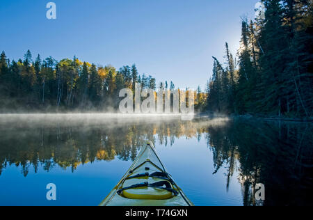 Kayaking at Glad Lake, Duck Mountain Provincial Park; Manitoba, Canada Stock Photo