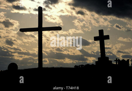 STORM CLOUDS OVER HEADSTONES IN A CEMETERY IN RURAL NEW SOUTH WALES, AUSTRALIA. Stock Photo