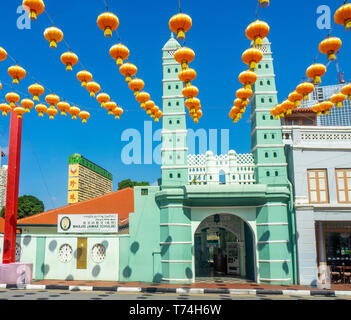 Chinese red lanterns for Chinese New Year in front of Chulia mosque on South Bridge Road Chinatown Singapore. Stock Photo