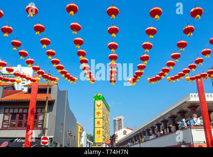 Chinese red lanterns for Chinese New Year celebrations over South Bridge Road Chinatown looking down Temple Street and People's Park Complex Singapore Stock Photo