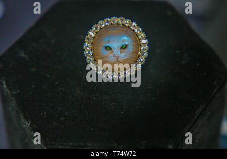London, UK. 04th June, 2019. Cat Brooch circa 1895, Moonstone, Diamonds and demantoid greet in silver topped gold, 1 1/8 inches in diameter@Paul Quezada-Neiman/Alamy Live News Credit: Paul Quezada-Neiman/Alamy Live News Stock Photo