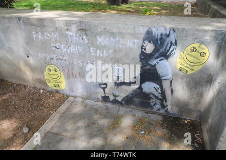 London, UK. 4th May, 2019. A new authentic artwork by Banksy has been covered in Perspex glass against damage at the site where the Extinction Rebellion climate change demonstrators protested and were camped out for more than a week in at Marble Arch Credit: amer ghazzal/Alamy Live News Stock Photo