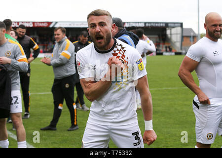 Morecambe, UK. 04th May, 2019. Dan Butler of Newport County celebrates reaching the playoffs at the end of the game. EFL Skybet Football league two match, Morecambe FC v Newport County at the Globe Arena in Morecambe, Lancs on Saturday 4th May 2019.  this image may only be used for Editorial purposes. Editorial use only, license required for commercial use. No use in betting, games or a single club/league/player publications. Credit: Andrew Orchard sports photography/Alamy Live News Stock Photo