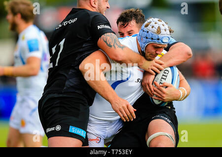 London, UK. 04th May, 2019. 4th May 2019, Allianz Park, London, England; Gallagher Premiership, Saracens vs Exeter Chiefs ; Richard Capstick (07) of Exeter receives a tackle Credit: Georgie Kerr/News Images Credit: News Images /Alamy Live News Stock Photo