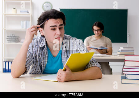 Two male students in the classroom Stock Photo