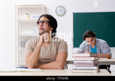 Two male students in the classroom Stock Photo