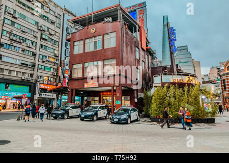 Taiwanese Police Station building with police officer cars parking in the front at Ximending, a popular shopping district in Taipei Stock Photo