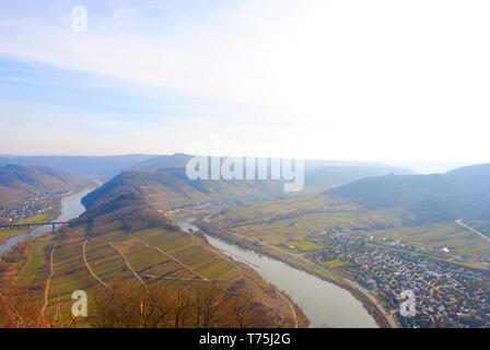 The breathtaking view on the famous moselle loop from the nearby hills. The moselle loop is located next to the village Bremm. Stock Photo