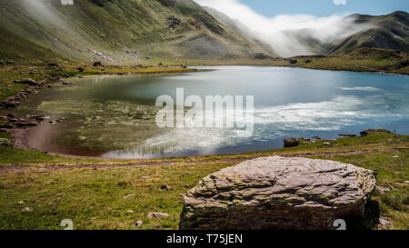 Ibon truchas, mountains lagoon in Astun ski station in Pyrenees, Huesca Spain Stock Photo