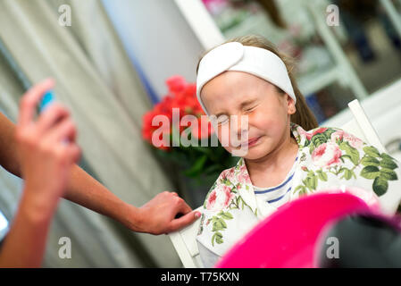 Girls enjoying the excitement of a birthday party at a children's spa Stock Photo