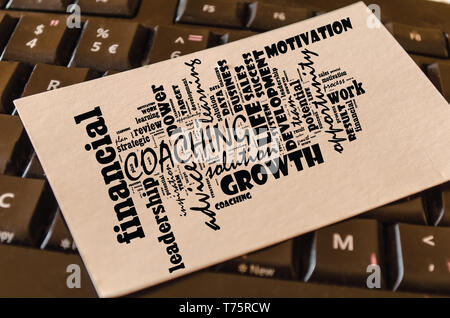 Coaching word cloud collage over keyboard background Stock Photo