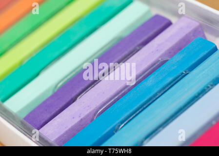 pastel chalk crayons in box macro selective focus Stock Photo