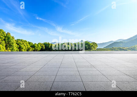 Empty square floor and green mountain natural landscape Stock Photo