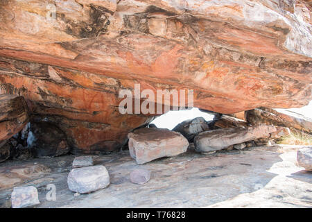 Aboriginal rock art on the natural stone surfaces at Kakadu National Park in the Northern Territory of Australia Stock Photo