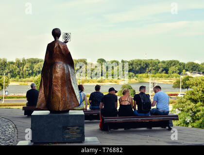 Monument to Marie Sklodowska-Curie, a Polish-French scientist, two-time Nobel laureate near Multimedia Fountain Park in Warsaw, Poland. Stock Photo