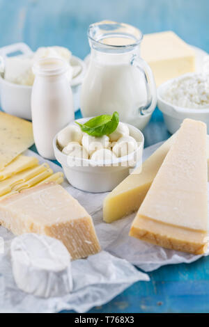Different types of dairy products on wooden background Stock Photo